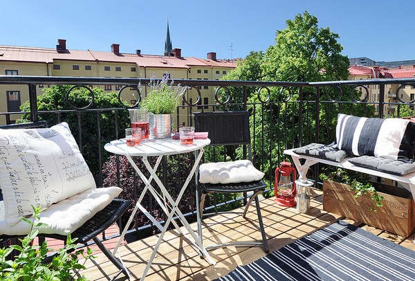 nice-balcony-idea-simple-whote-round-table-nice-black-rattan-chair-nice-white-bench-lovely-cushion_001